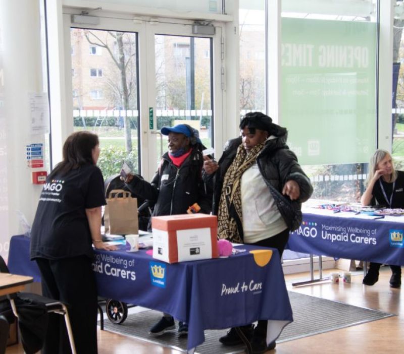 carers talking to an imago member of staff